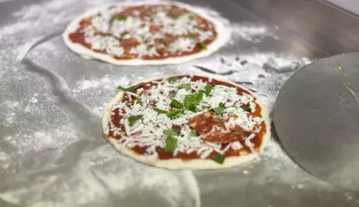 Pizzas in the making How to make pizza in Italy