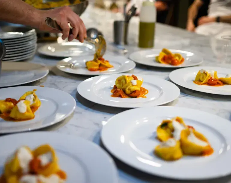 Pasta and risotto cooking class in Milan